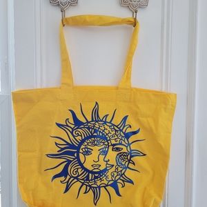 Moon and sun yellow tote bag